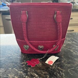 Brighton pink bag/crossbody NWT
Braided handles; zipper closure